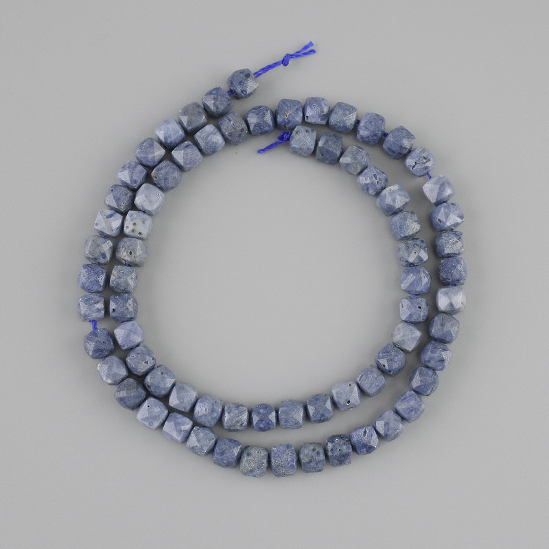 Coral beads, spongy coral faceted cube shape, diameter 5x5 mm +- , length 37 cm +- on a thread
