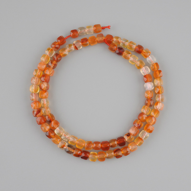 Carnelian beads faceted cube, diameter 4.5 mm ±, length 39 cm ± on a string