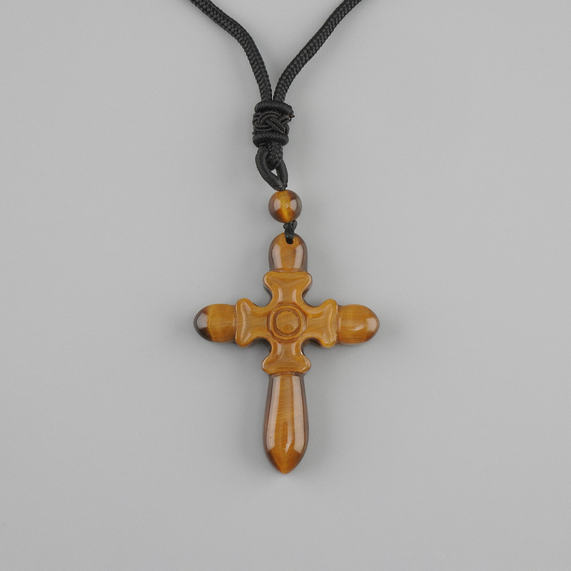 Cross pendant Tiger's eye, diameter 47×36 mm ± on a black cord with a drawstring clasp, length 78 cm +