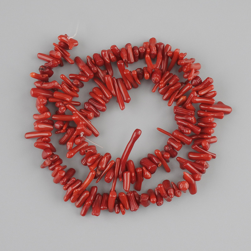 Coral beads, spear-shaped rubble, diameter 6-12x2-3 mm +/-, length 39 cm +/- on a thread