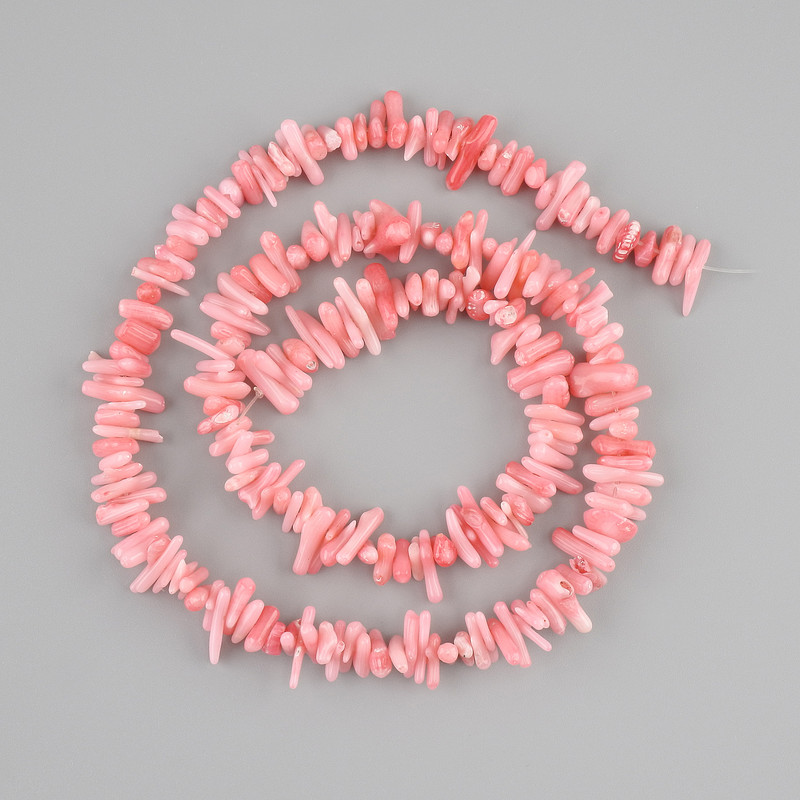 Coral beads pink tumbled needle, diameter 7-10x1-2mm ±, length 42cm ± on nylon thread