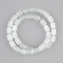 White Cat's Eye cylinder beads, diameter 10, 5x8mm +/-, length 37cm +/- on a thread