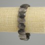 Bracelet Silvered Obsidian rounded faceted link, diameter 15×10, 5-11mm+- , length 18cm+- stretch