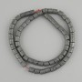 Hematite beads, porous cylinder, diameter 6×6 mm +-, length 40 cm +- on a cord