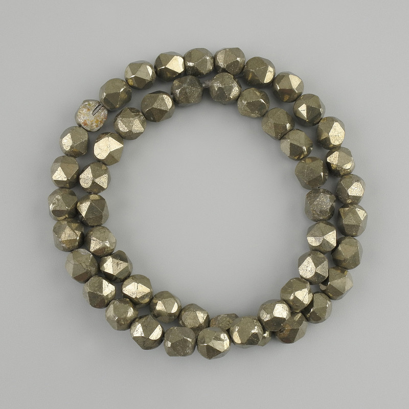 Pyrite beads faceted, diameter 8x7mm +- , length 40cm +- on a thread