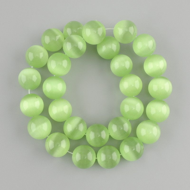Cat’s Eye beads smooth round bead, diameter 13.5-14 mm +/-, length 37 cm +/- on a string