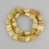Stone coral beads square 14x14mm+-, length 39cm+- on a string