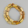 Fossilized coral beads rectangular 15-9, 5-10 mm +- length 39 cm +- on a string
