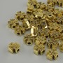 Bead inset cross metal finish yellow gold color, diameter 7x7mm+- hole diameter 2mm+- packaged 20g. (~39 pcs.)