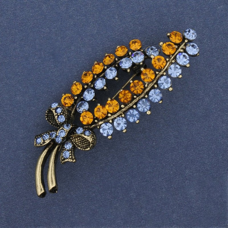 Brooch Branch yellow and blue rhinestones silver-colored metal 64x23mm +