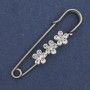 Brooch pin white rhinestones 48x10mm+- silver-colored metal