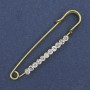 Brooch pin white rhinestones 60x12mm+- gold-tone metal