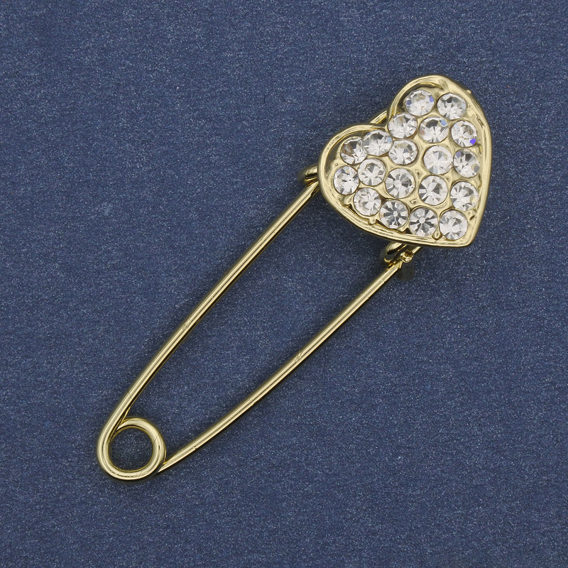 Stick brooch, pin with white rhinestones 38x12mm+- gold-toned metal
