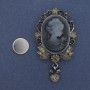 Cameo brooch on a magnet Lady, rhinestones, silvery metal 85x35 mm +
