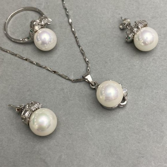 Set pendant on a chain 40cm+- studs ring size 18. Majorca pearl