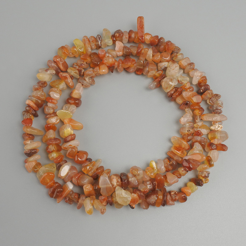 Carnelian chip beads, diameter 6-14x4-6, 5mm+- , length 78mm+- on a thread