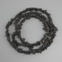 Lava stone beads, chip, diameter 6–11×3–7 mm +/-, length 80 mm +/- on nylon thread