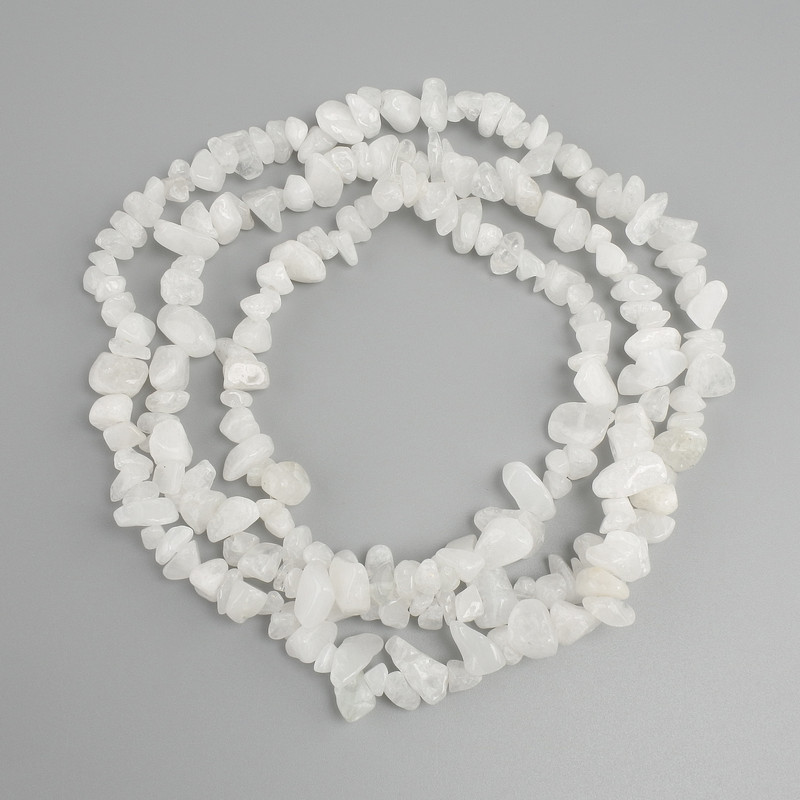 Beads White Quartz crystal chunks, diameter 5-13x4-7mm +/- , length 78cm +/- on a nylon thread