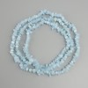 Aquamarine tumbled chips beads, diameter 4-9x2-4mm +/-, length 76cm +/-, on a nylon thread