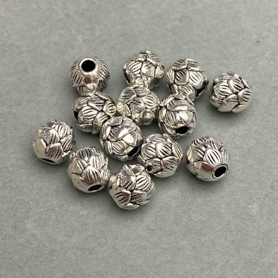 Silver-colored bead-insert hardware, metal color silver, diameter 7 mm ±, hole diameter 2.2 mm ±, packaged 20 g ~19 pcs +