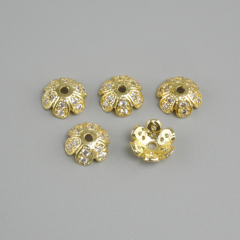 Price per 1 pc. Jewelry findings end cap, diameter 7.5×1.5 mm±, hole diameter 1.1 mm±, gold-colored metal