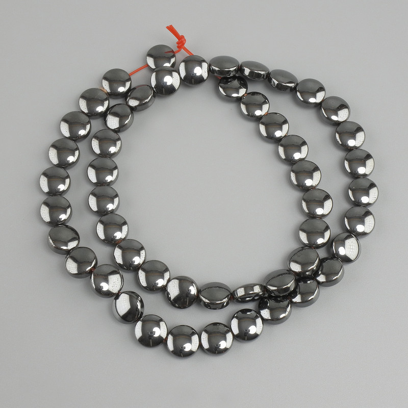 Hematite beads coin-shaped, diameter 8mm +/-, length 41cm +/- on nylon thread