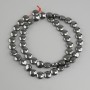 Hematite beads coin-shaped, diameter 8mm +/-, length 41cm +/- on nylon thread
