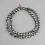 Hematite coin beads, diameter 6mm +/-, length 41cm +/- on a nylon thread