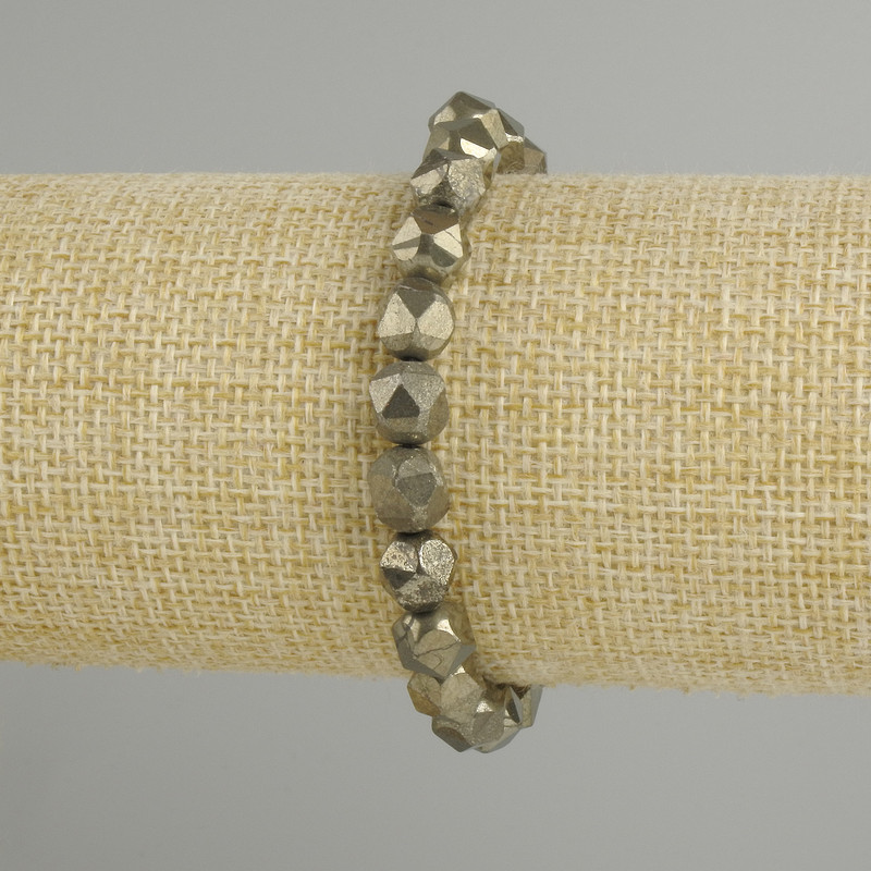 Pyrite bracelet faceted pieces, diameter 8x7mm +- , length 18cm +- on stretch