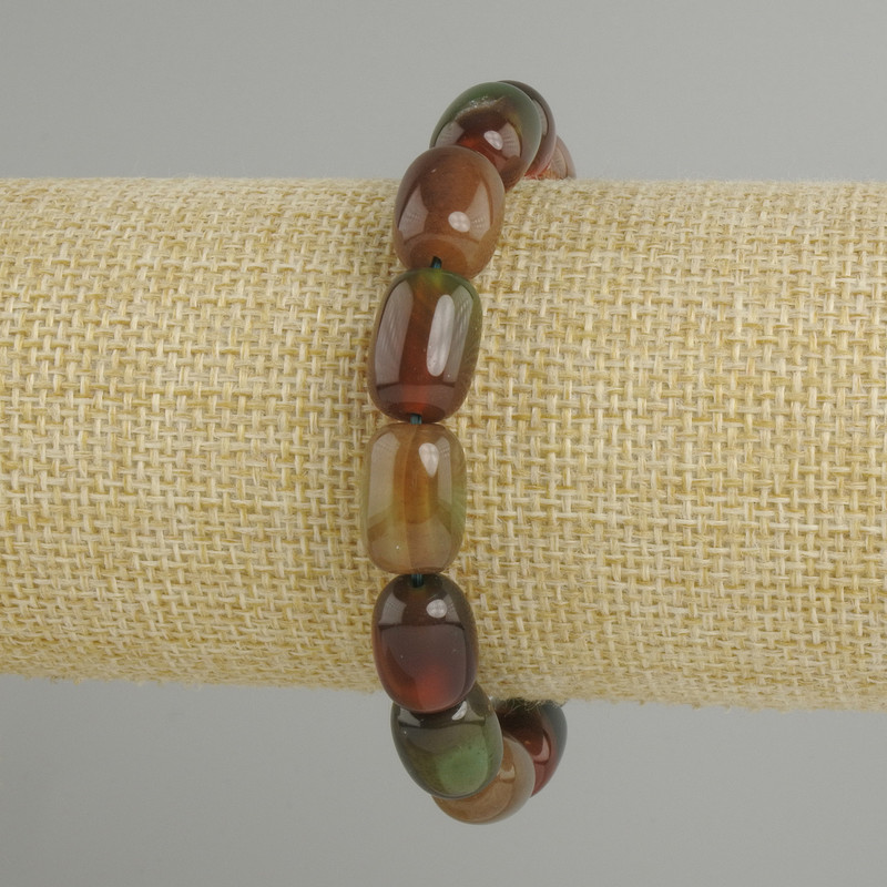 Agate bracelet barrel shape, diameter 14x10mm +/-, length 18cm +/- stretch