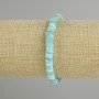 Bracelet with scapharca shell scallop rondelle, diameter 6x2mm +- , length 18cm +- stretch