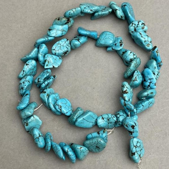 Turquoise Howlite tumbled beads 14-16×9-11mm +-, length 40cm +- on a nylon thread