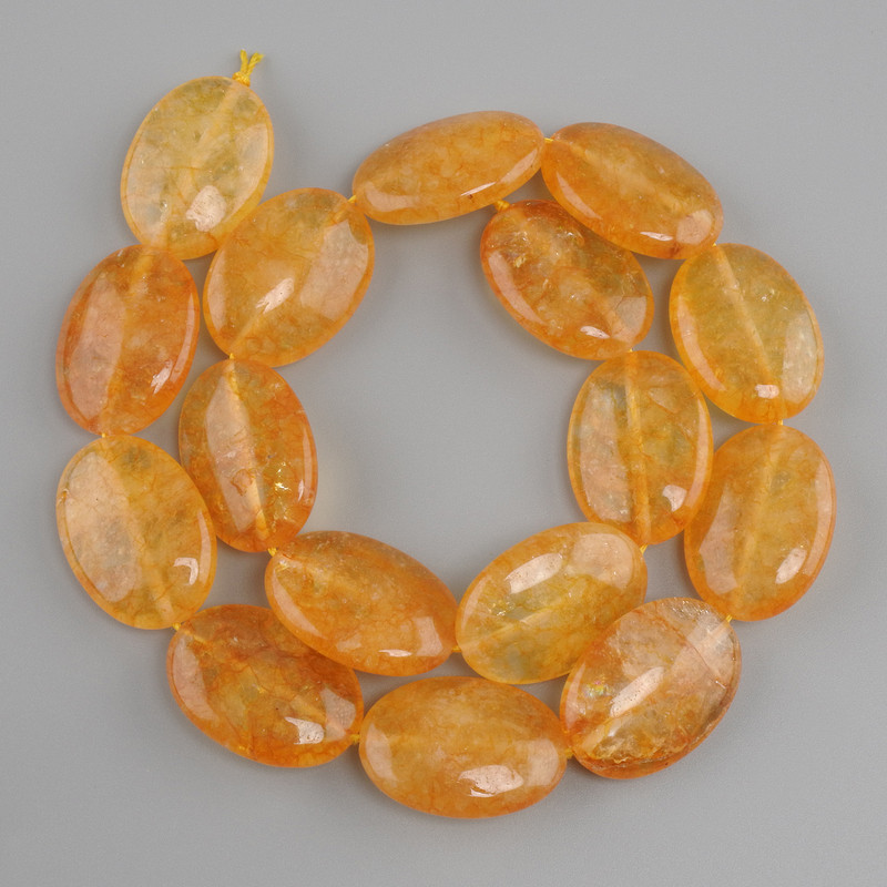 Citrine oval beads, diameter 25x18 mm +/-, length 39 cm +/-