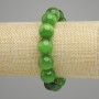 Bracelet green Cat's Eye smooth bead, diameter 13.5 mm ±, length 18 cm ± stretch