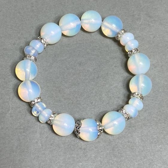 Bracelet Opalite moonstone bead 12mm+- rondelle 8x5mm+- with inserts, length 18cm +- stretch