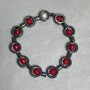 Bracelet Coral faceted bead 5mm± Hematite circle 12mm± length 18cm± stretch