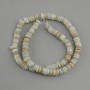 Shell beads Scapharca rondelle, diameter 7x1, 5-2mm+-, length 39cm+- on a thread