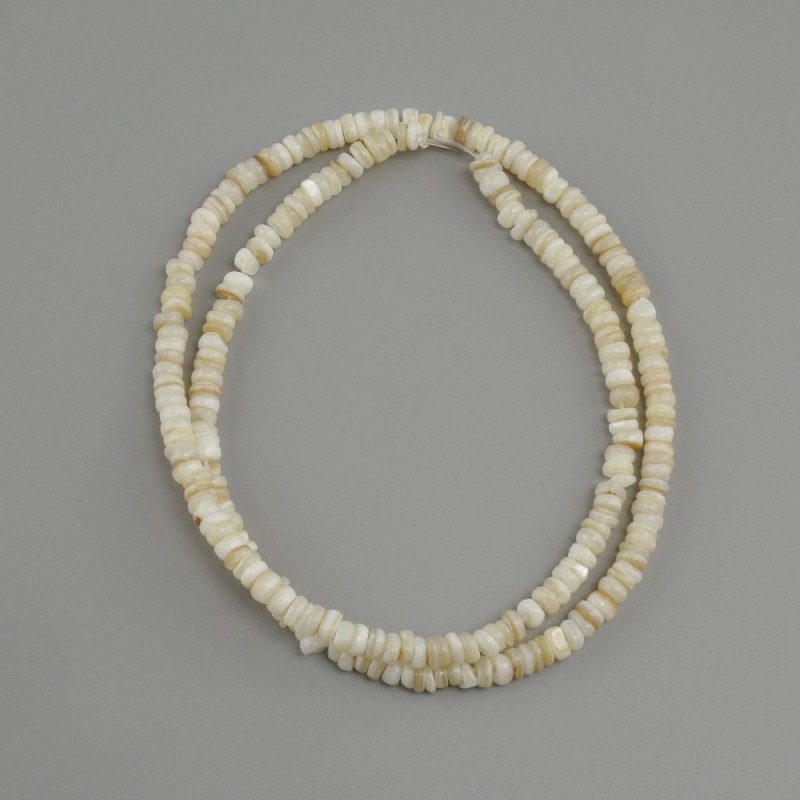 Shell beads Scapharca rondelle, diameter 4×1.5–2 mm ±, length 38 cm ± on a thread