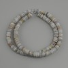 Scafarus shell beads in rondelle shape, diameter 6x1, 5-2mm+- , length 39cm+- on a nylon thread