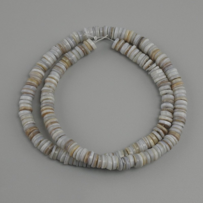 Scafarus shell beads in rondelle shape, diameter 6x1, 5-2mm+- , length 39cm+- on a nylon thread