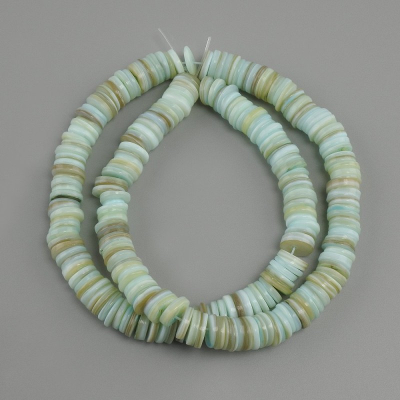 Scapharca shell beads in rondelle shape, diameter 8x1, 5–2 mm ±, strand length 39 cm ± on elastic thread