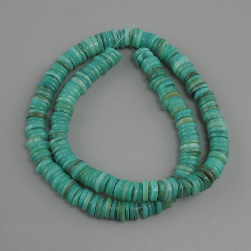 Shell beads Scapharca rondelle, diameter 8x1.5–2 mm+- , length 39 cm+- on fishing line