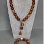 Choker set with carnelian cylinder 15×14mm (+/-), length 41cm (+/-) Toggler bracelet, length 18cm (+/-) stretch