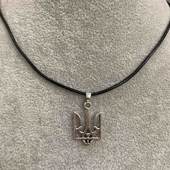 Trident pendant 25x15mm+- silver-toned metal on eco-leather cord, length 60cm +5cm chain
