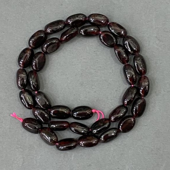 Garnet tumbled beads 12×8 mm, strand length 40 cm+