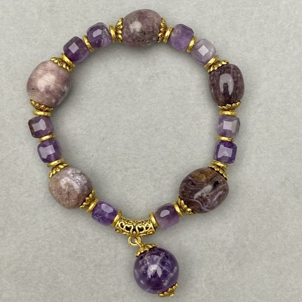 Amethyst bracelet tumbled 15x12mm ± faceted cube 7mm with inserts, length 18cm ± stretch