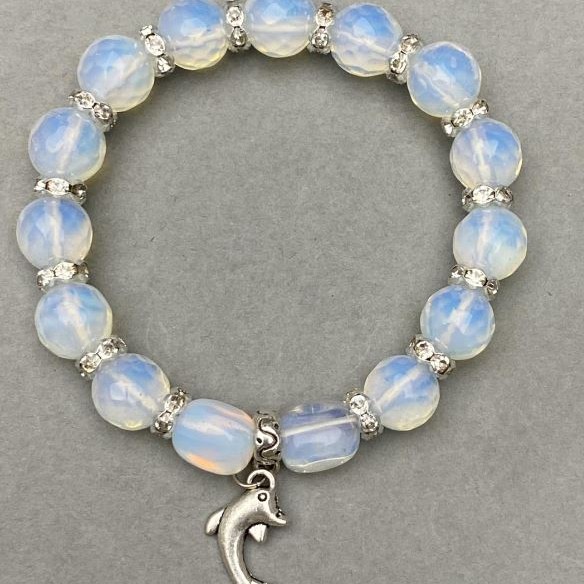 Opal bracelet faceted round bead 10mm+- bar 11x8mm+- with inserts, length 18cm+- stretch