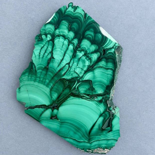 Souvenir stone plate made of natural malachite 72x68x10 mm +- weight 126 grams