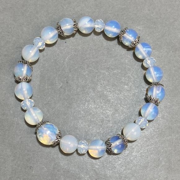 Opalite bracelet round bead 8mm+- faceted rondelle 6x5mm+- with inserts, length 18cm+- stretch