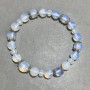 Opalite bracelet round bead 8mm+- faceted rondelle 6x5mm+- with inserts, length 18cm+- stretch